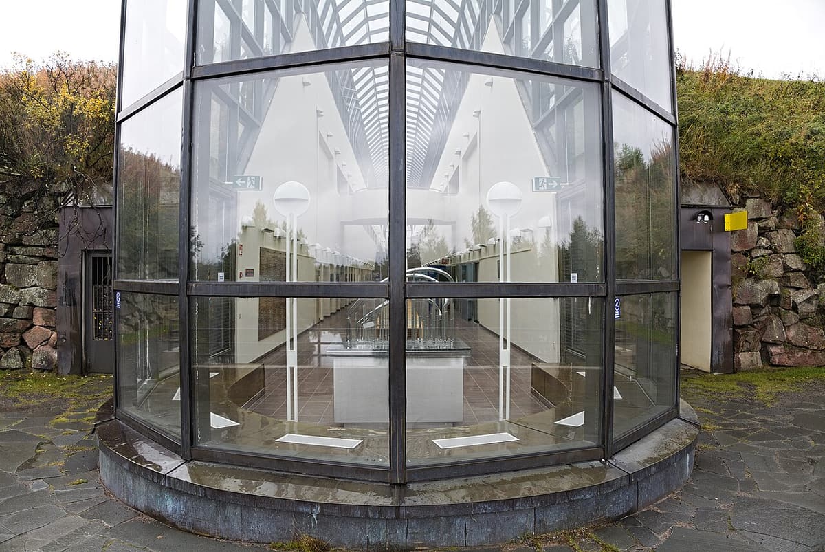 The glass end of Arktikum’s long corridor, seen from the riverside garden